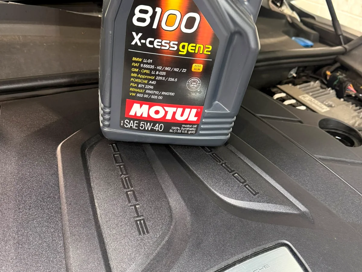 Motul 8100 oil on a Porsche engine cover